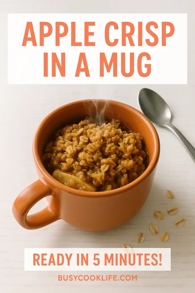 Apple crisp in a mug Pinterest pin showing 5 minute recipe with terracotta mug and oat topping