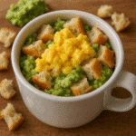 Avocado egg toast in a mug with creamy mashed avocado and fluffy scrambled egg - tested BusyCookLife recipe