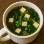 Miso soup in a mug with tofu and green onions from BusyCookLife kitchen